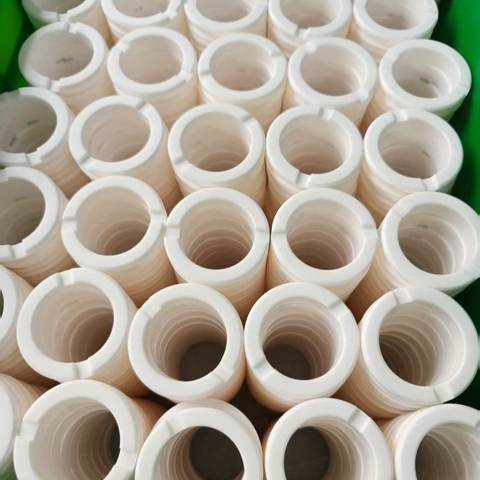 White ceramic rings in batches